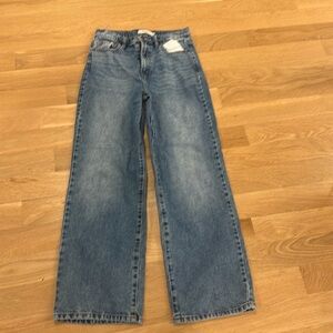 Badely worn hidden wide leg jeans